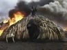 Kenia, 30/04/2016. Vista de la quema de colmillos de elefante, cuernos de rinoceronte y figuras de marfil en el Parque Nacional Nairobi. || AFP Photo / Fredrok Lerneryd