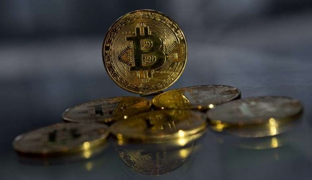 El bitcoin alcanzó los 18.000 dólares en su debut en el mercado de futuros