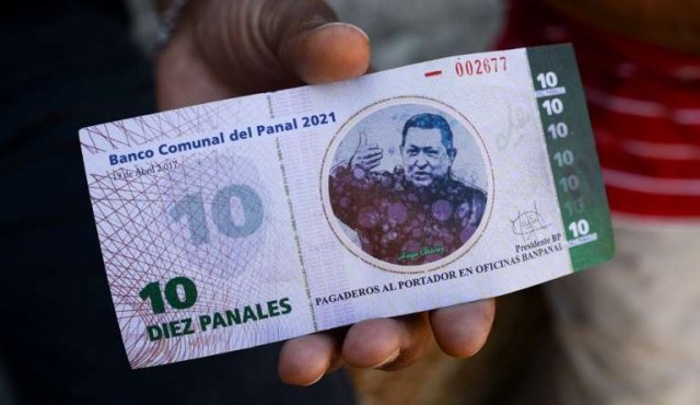 En un barrio venezolano crean moneda con imagen de Chávez