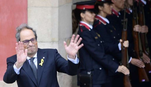 Cataluña inviste como presidente a un independentista del ala dura
