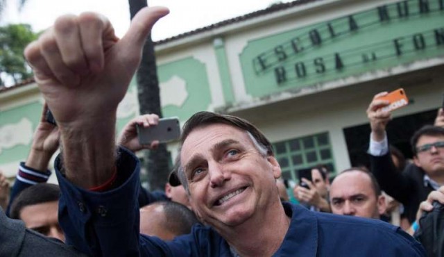 Bolsonaro y Haddad en campaña para la segunda vuelta de las elecciones en Brasil