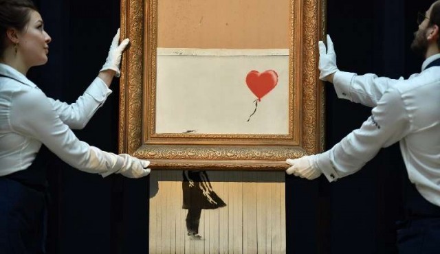 El lienzo autodestruido de Banksy se expone en Alemania​