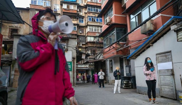La ciudad china donde se inició el coronavirus empieza a levantar su confinamiento