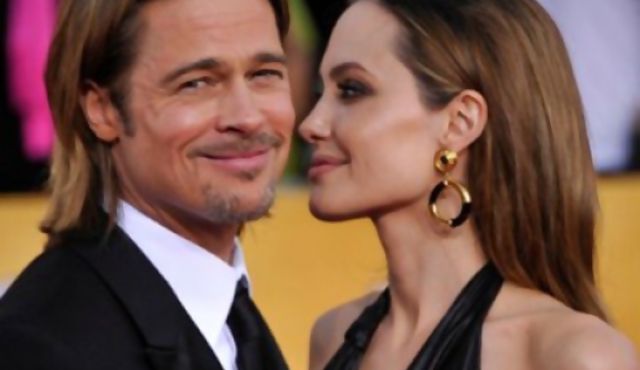 Brad Pitt celebra como productor
